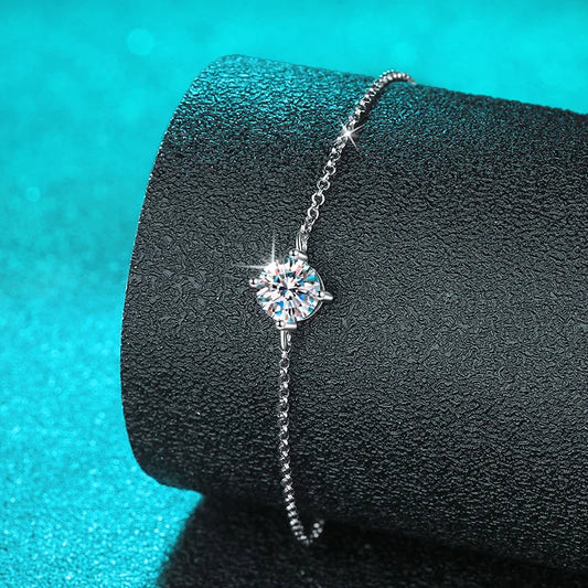 Dazzle with elegance in this adjustable 925 Sterling Silver bracelet featuring a stunning 1CT 6.5mm lab-created diamond