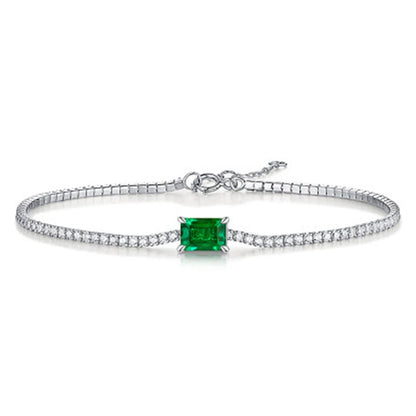 Inlaid with lab-grown emeralds, this vintage tennis bracelet is crafted from 925 sterling silver and finished with white gold plating. Available in 6.7-inch and 7.5-inch sizes