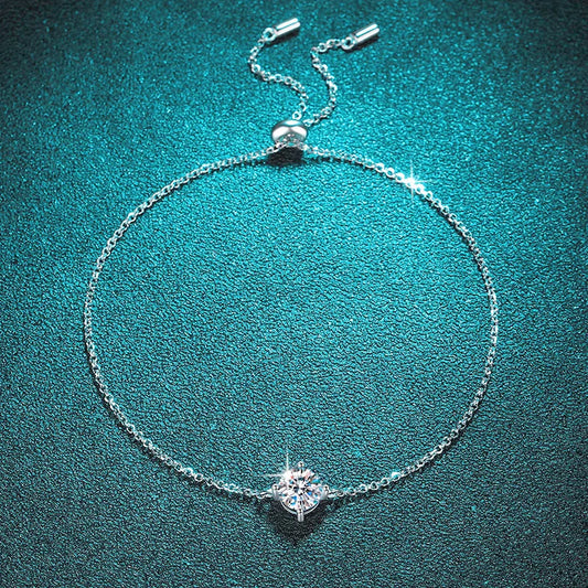Dazzle with elegance in this adjustable 925 Sterling Silver bracelet featuring a stunning 1CT 6.5mm lab-created diamond